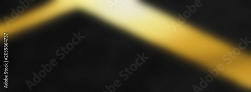 Tableau sur toile Diagonal gold light leak with grainy texture across dark background for creative prism effects and vibrant aesthetic digital art projects