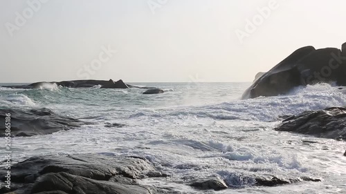 The scenery of huge waves crashing against the rocks