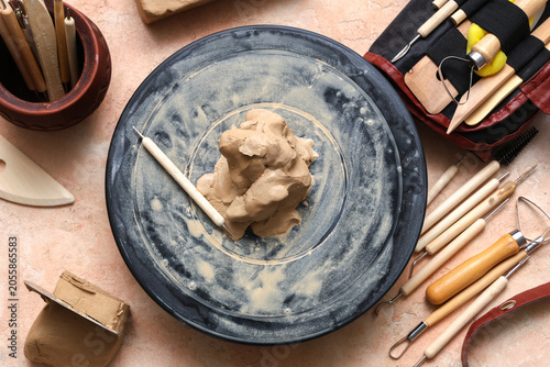 Pottery wheel with clay and...