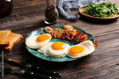 Plate with tasty fried eggs...