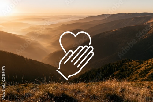 A serene mountain landscape illuminated by golden morning sunlight, featuring rolling hills and distant peaks, creating a tranquil atmosphere
