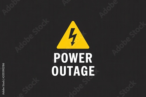 Power outage warning sign on dark gray background