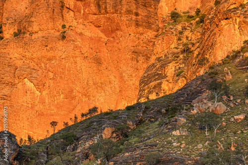 Quadro su tela Orange and yellow sunset colours on the cliffs of the Bungle Bungle Range in Purnululu National Park