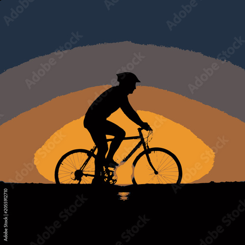 Man Riding Bicycle at Sunset Silhouette.