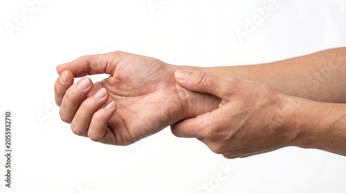Close-up of a person holding their painful wrist indicating carpal tunnel syndrome or injury isolated on a white background.