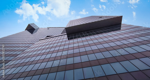 Modern business office building skyscraper with brown glass facade in Vienna Austria