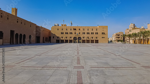 Justice Square in Riyadh Saudi Arabia with traditional mud brick architecture and large stone paved plaza
