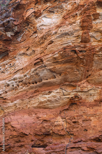Detail showing the layering from eroided Devonian-age quartz sandstone in gorge walls in the Bungle Bungle Rangers, Purnululu National Park.