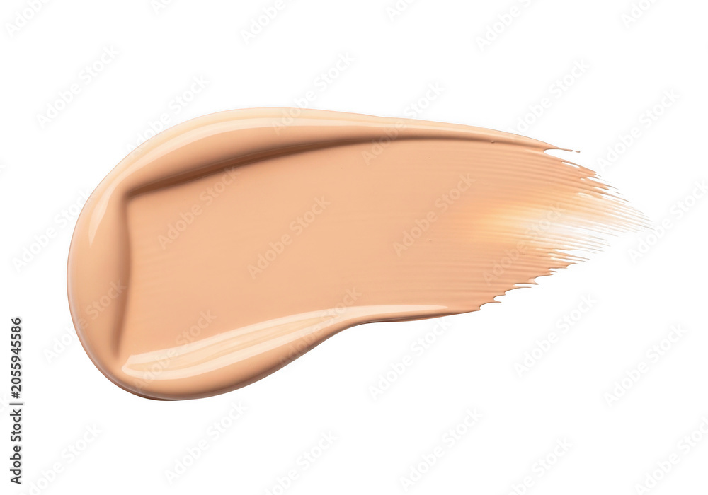 Fototapeta premium Beige liquid foundation makeup smear isolated on a white background