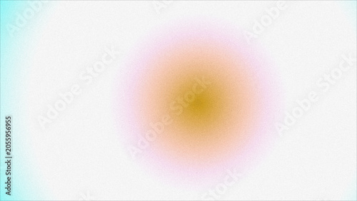 Soft glowing light spot on plain background