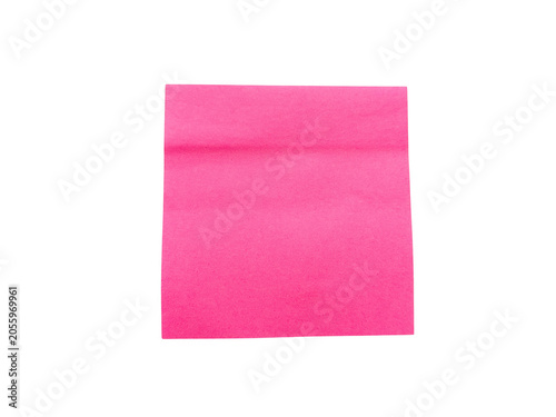 Bright pink sticky note on a flat surface