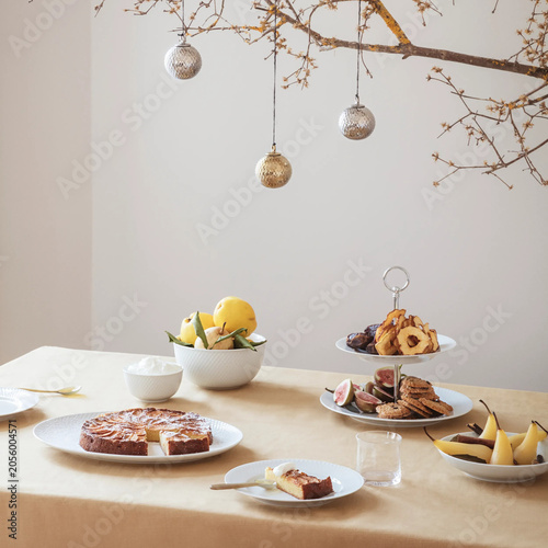 Christmas dessert table with cake and dried fruit snacks