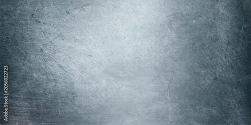 Tableau sur toile A weathered, textured metal surface with a brushed finish, showing subtle scratches and a cool, industrial gray tone, creating a rugged and robust backdrop