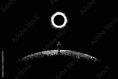 Fotografie Astronaut silhouette gazing at solar eclipse monochromatic illustration