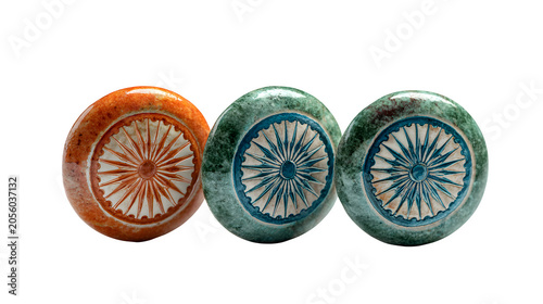 Three decorative stone drawer pulls with carved starburst design isolated on transparent background