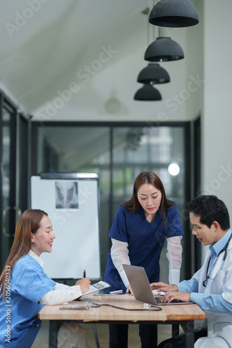 Medical Team Discussion and Collaboration in the Office