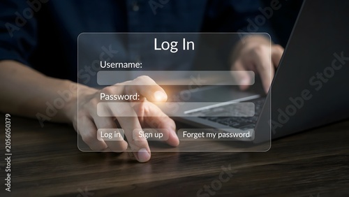 Person typing login credentials on digital tablet with secure access interface in dark workspace