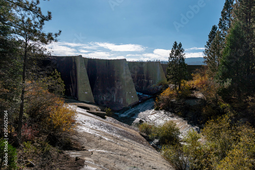 Historic Hume Lake Dam Concrete Structure with Autumn Foliage California