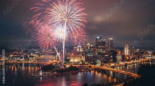Usa independence day fireworks over pittsburgh skyline vibrant celebration display