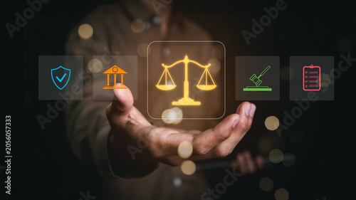Foto Business professional presenting a digital justice scale with legal and governance icons, representing law, compliance, regulation, corporate ethics, risk management, and judicial decision-making