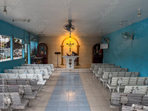 Fotografie Interior of a humble Catholic chapel in Dumaguete, Philippines.