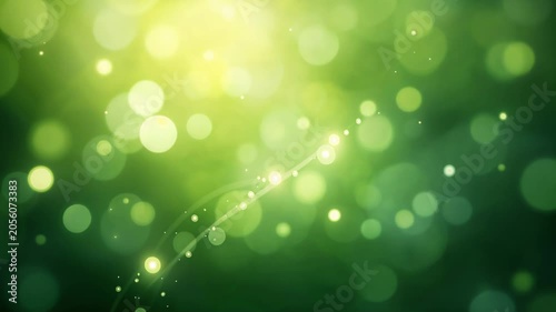 Abstract green background with floating bokeh lights, glowing particles, and elegant light streaks