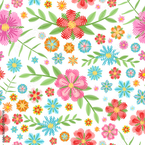 Square seamless embroidery with flowers and green leaves on white background. Vector image.