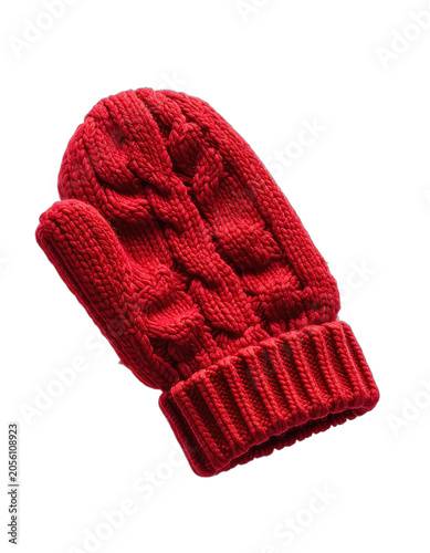 A single red knitted mitten isolated on a black background.