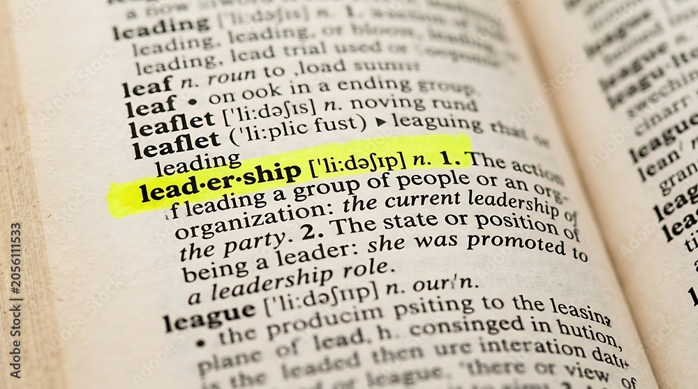 Obraz premium Leadership definition highlighted in dictionary macro shot for corporate management training