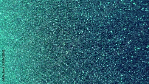 Sparkling turquoise glitter background, with gradients of, blue and green hues