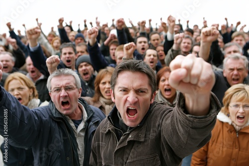 Crowd of angry people protesting