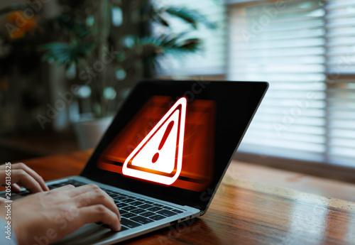 Canvastavla Laptop displaying critical cybersecurity warning alert, online threat detection, malware attack risk, data breach protection, network security monitoring and digital safety technology concept