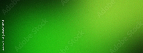 Abstract blurred green gradient wallpaper with grainy textured effect.