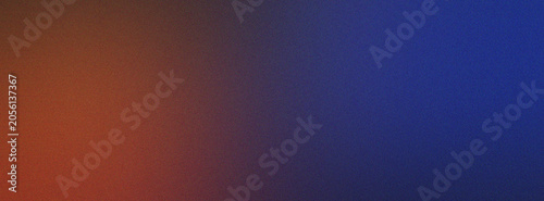 Abstract gradient background with soft blue and orange light blending.