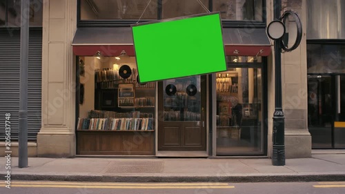 Vintage Record Store Facade with Hanging Green Screen Sign Mockup