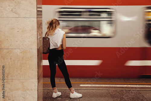 Waiting for Transportation on a Moscow Metro Platform During the Day