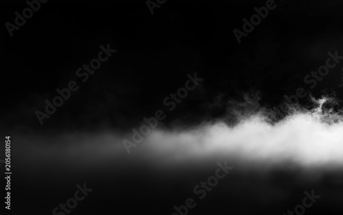 White fog overlay on black background, realistic low smoke effect with soft mist and dark atmospheric look for cinematic poster, stage scene, horror design or photo composition.