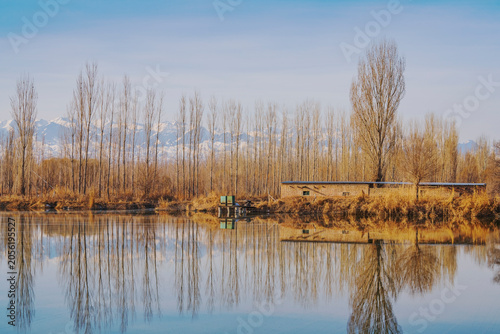 The natural beauty of the Tianshan Mountains and Swan Lake in winter in Xinjiang, China on March 3, 2023