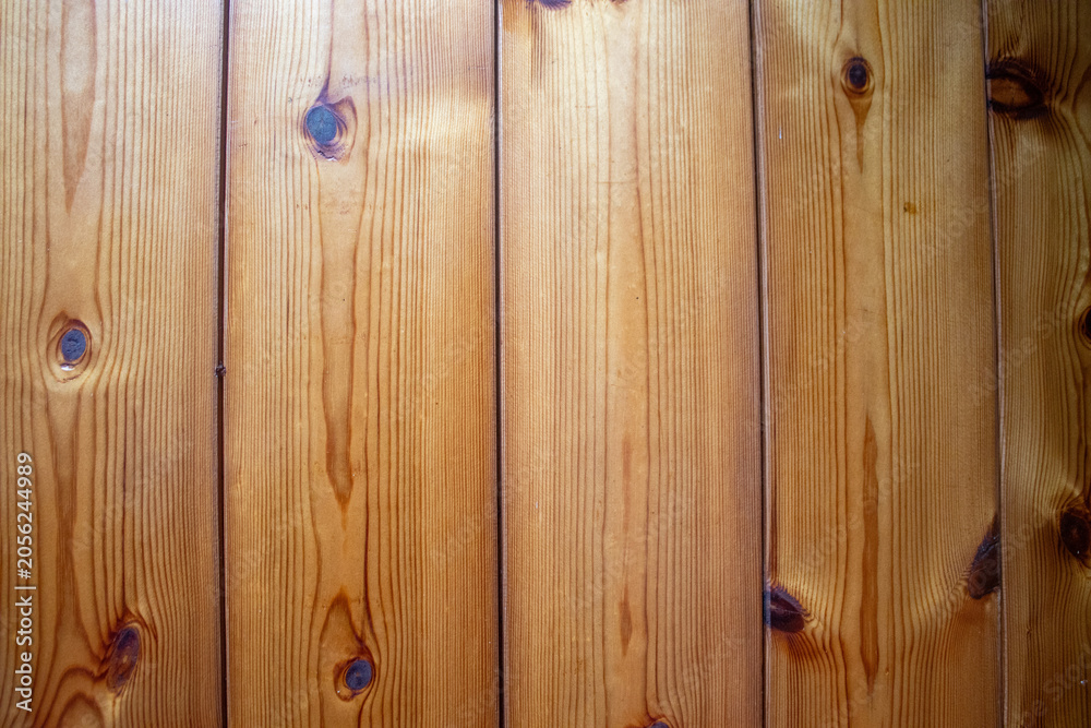 Fototapeta premium Natural Pine Wood Panel Texture Background with Visible Grain and Knots