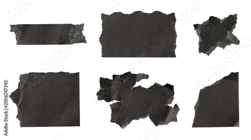 Fotografie Collection of black torn paper pieces with distressed edges, isolated on a transparent background for graphic design