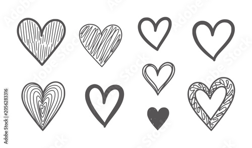 Collection of eight hand drawn dark grey hearts with varied patterns and textures