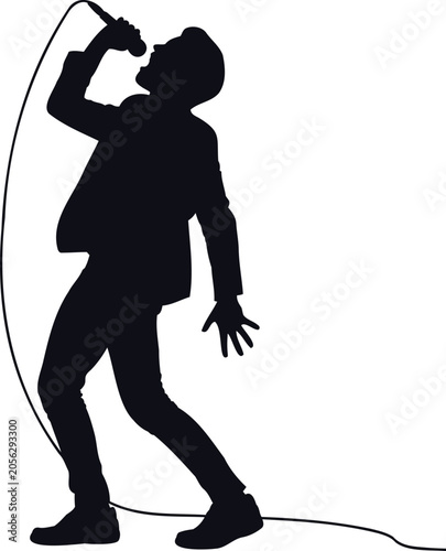 Foto Silhouette of man singing into microphone with cord  music performance