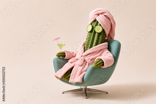 Cucumber and aloe vera with pink towel, natural skincare and wellness concept