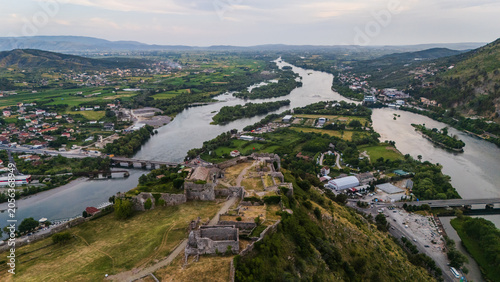 Aerial view of Rozafa Castle in Shkodër, Albania. Historical fortress panorama with Drin and Buna rivers, bridge, and scenic Balkan landscape