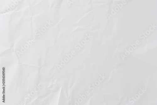 Bild auf Leinwand Crumpled white paper texture background with soft, subtle folds and creases