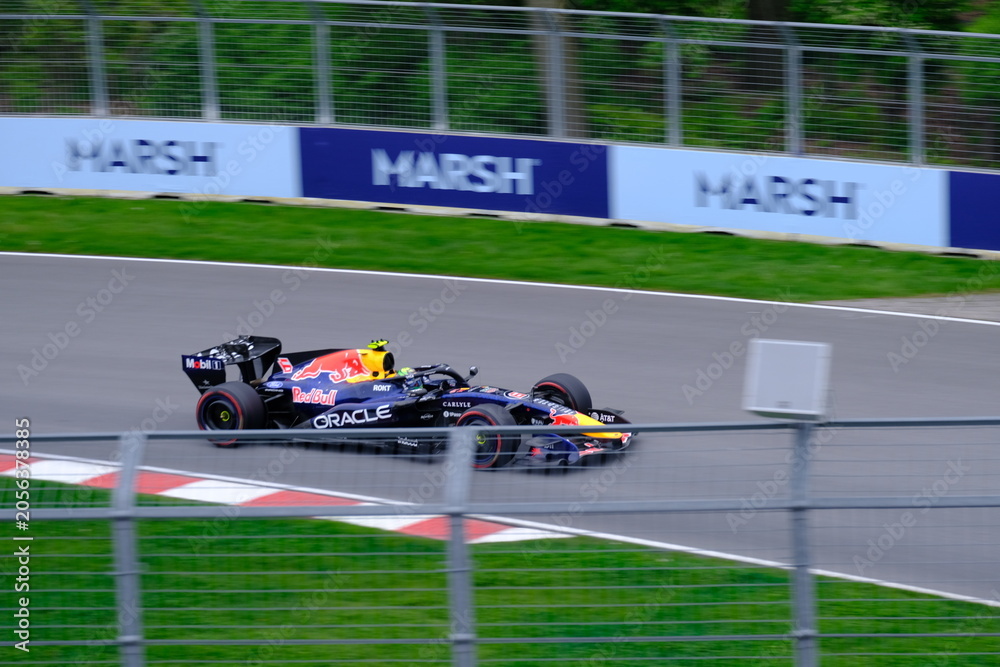 Naklejka premium May 24, 2025, Montreal, Canada: Red Bull Racing Formula 1 car during by Hadjar or Verstappen, demonstration run at Circuit Gilles Villeneuve. g.