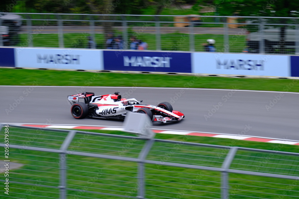 Naklejka premium May 24, 2026, Montreal, Canada - Haas Formula 1 car on track by Ocon and Bearman at Circuit Gilles Villeneuve. g.