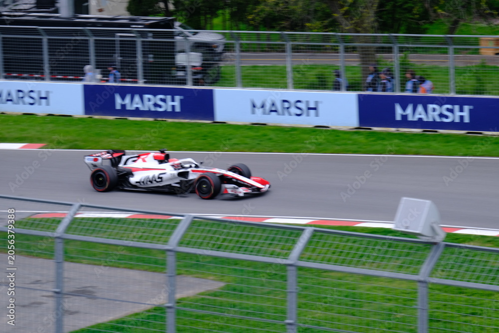 Naklejka premium May 24, 2026, Montreal, Canada - Haas Formula 1 car on track by Ocon and Bearman at Circuit Gilles Villeneuve. g.