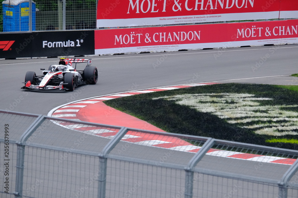 Naklejka premium May 24, 2026, Montreal, Canada - Haas Formula 1 car on track by Ocon and Bearman at Circuit Gilles Villeneuve. g.