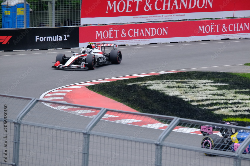 Naklejka premium May 24, 2026, Montreal, Canada - Haas Formula 1 car on track by Ocon and Bearman at Circuit Gilles Villeneuve. g.